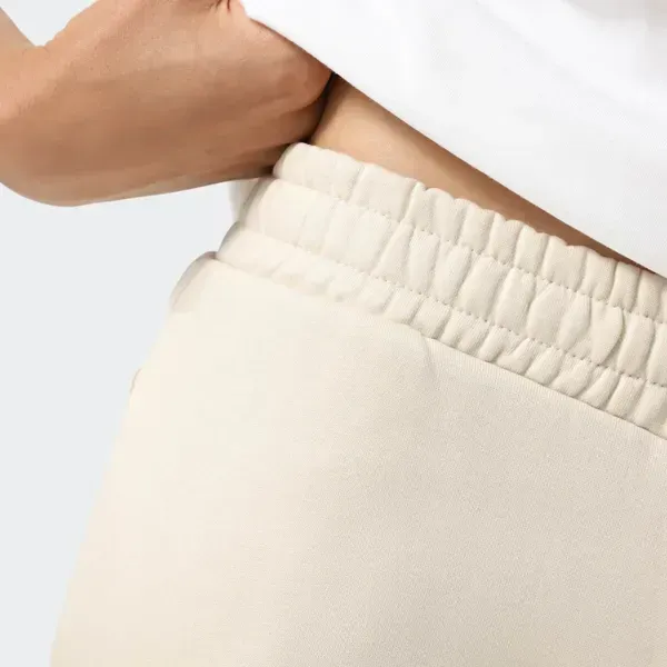 Штани Puma Штани спортивні ESS TAPE Sweatpants Puma XS Бежевий | 68809887 68809887 фото