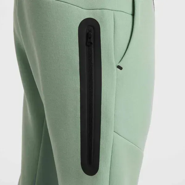 Підліткові штани Nike Sportswear Tech Fleece | HV5869-037 фото