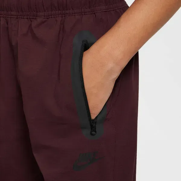 Підліткові штани Nike Tech | HQ8921-652 фото